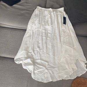 Below knees white flowy skirt from lulus. Not see through